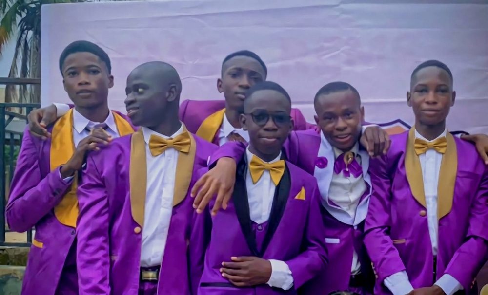 SamGenie with his best friends in coordinated purple suits